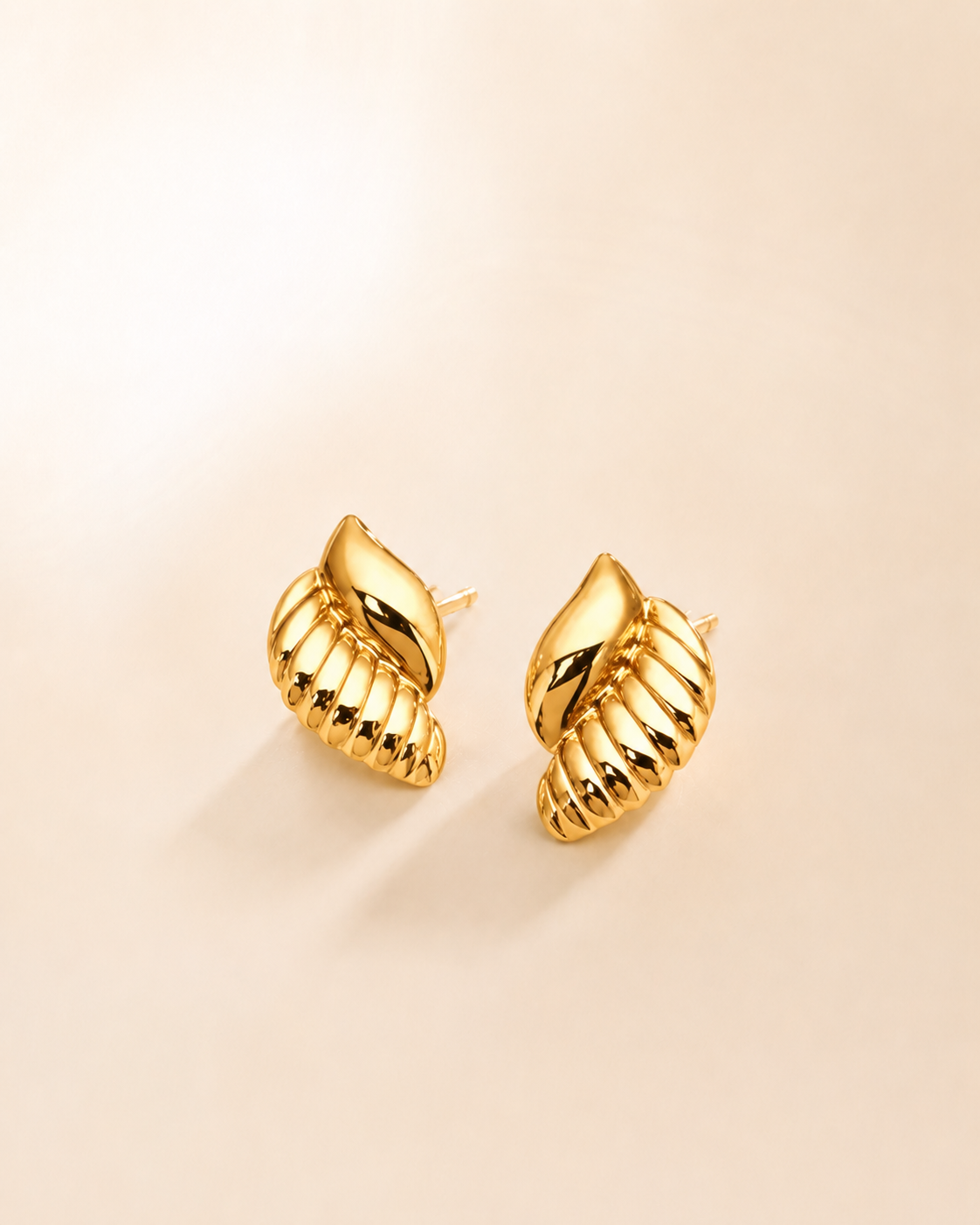 Gold ribbed clip-on earrings