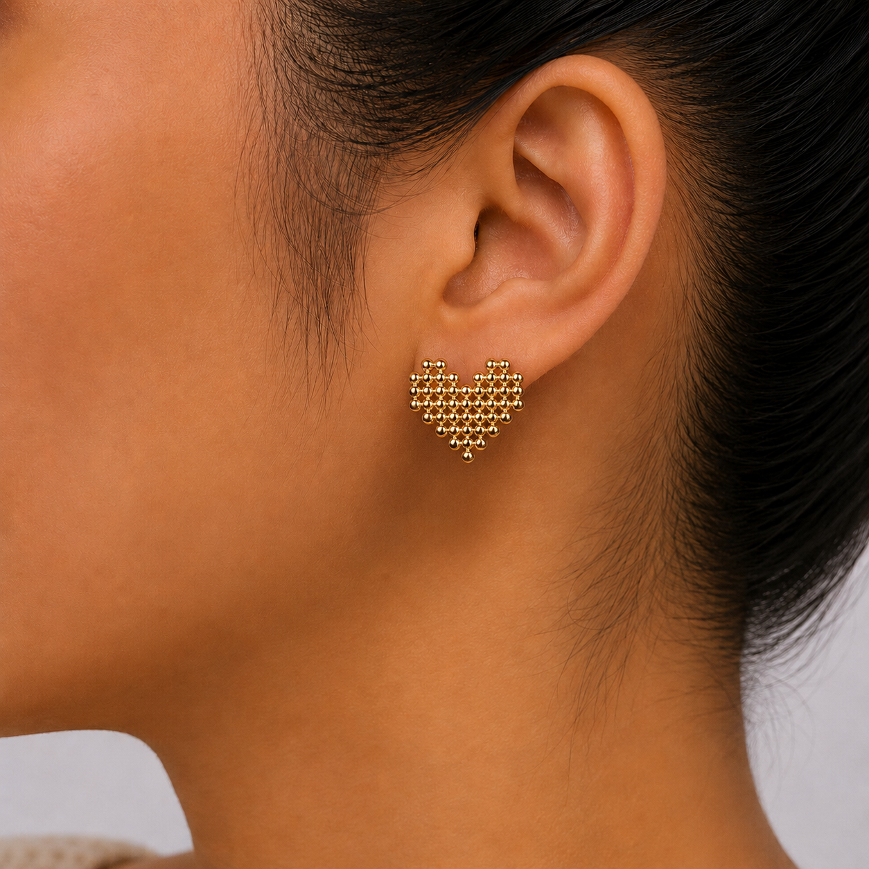 The Pixel heart studs