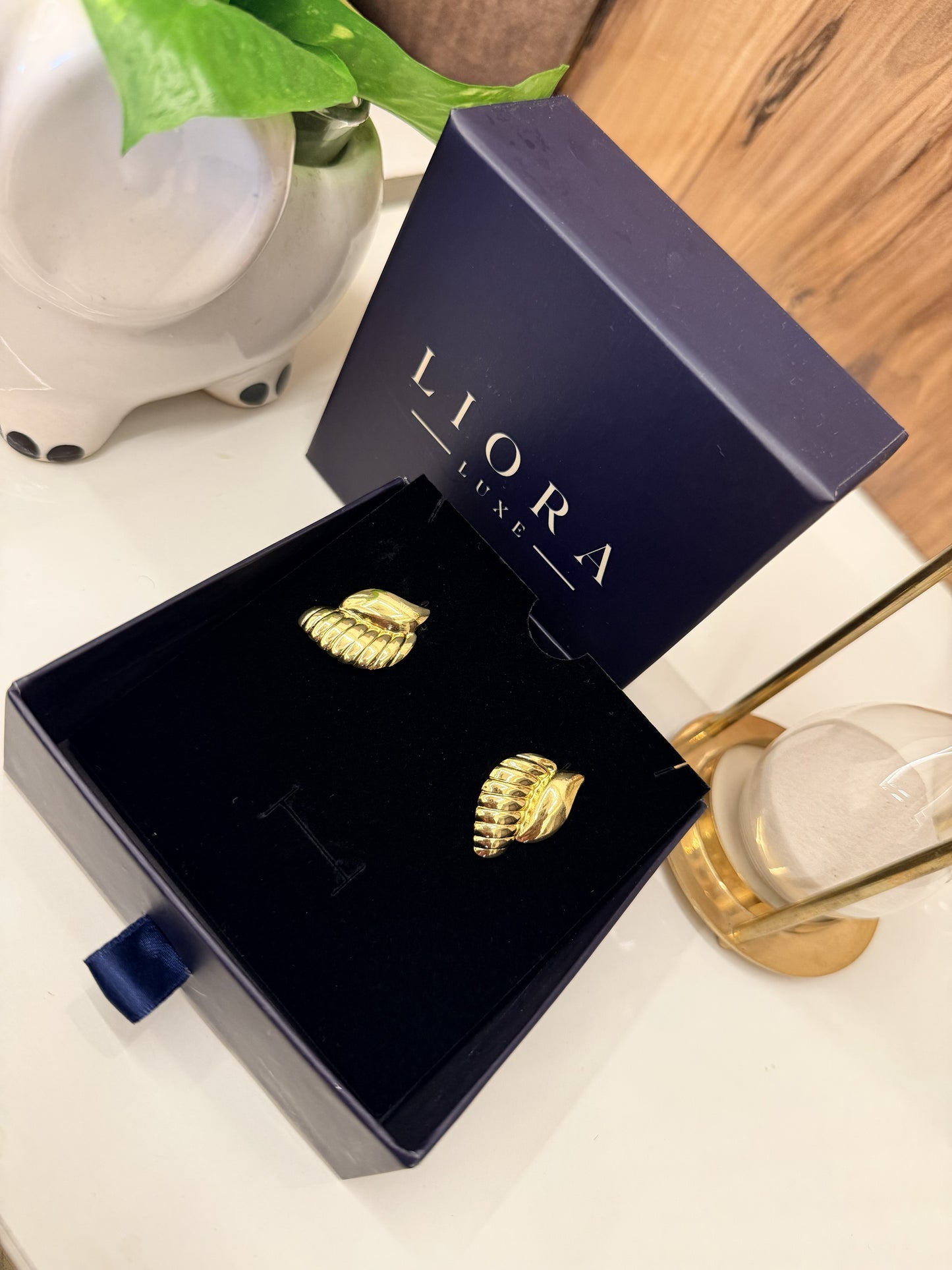 Gold ribbed clip-on earrings