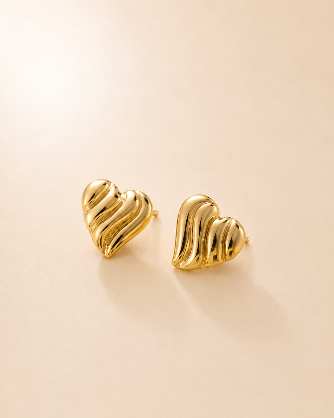 The Ripple Heart Studs